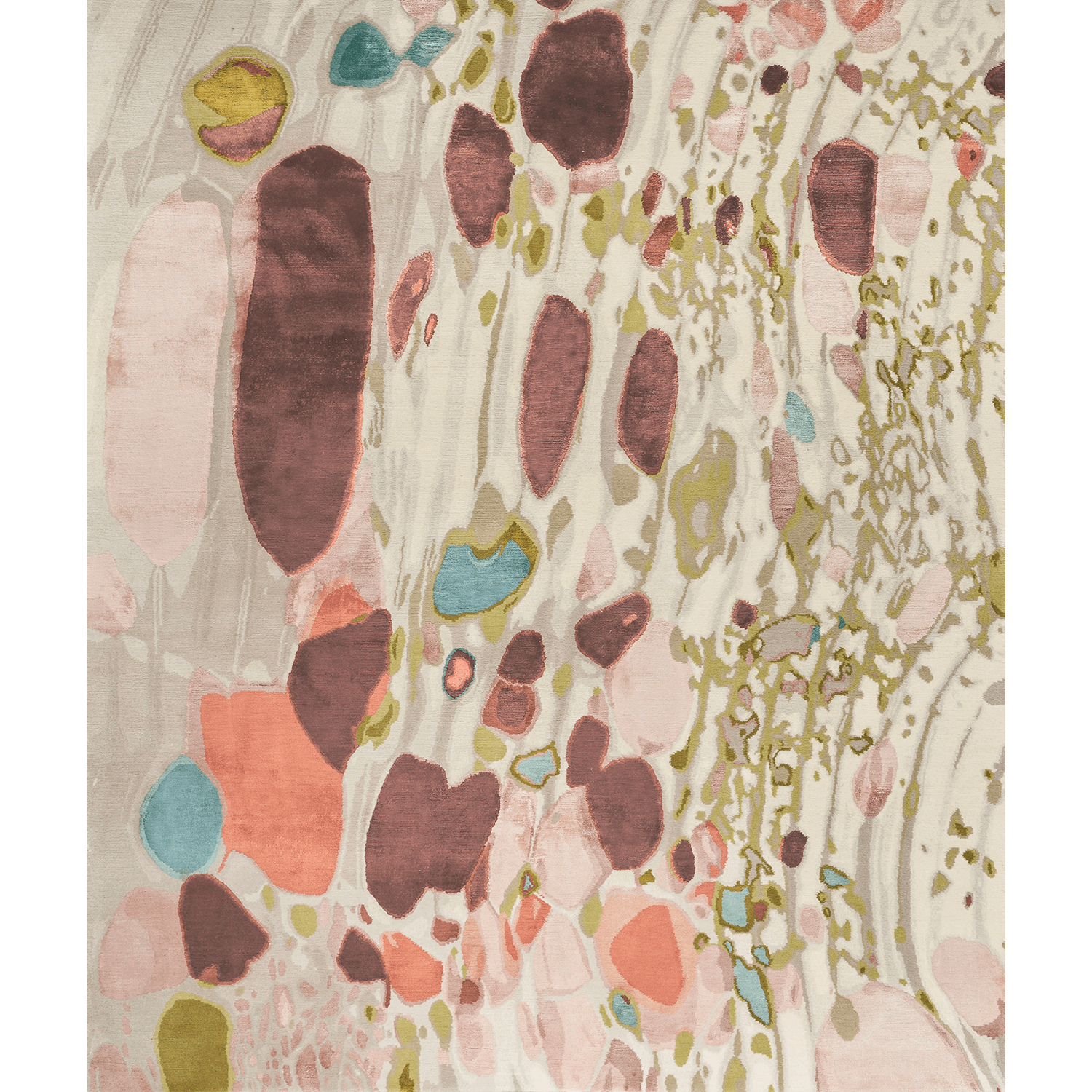 A white rug patterned with geometric shapes in bright shades of pink, blue, green and purple.