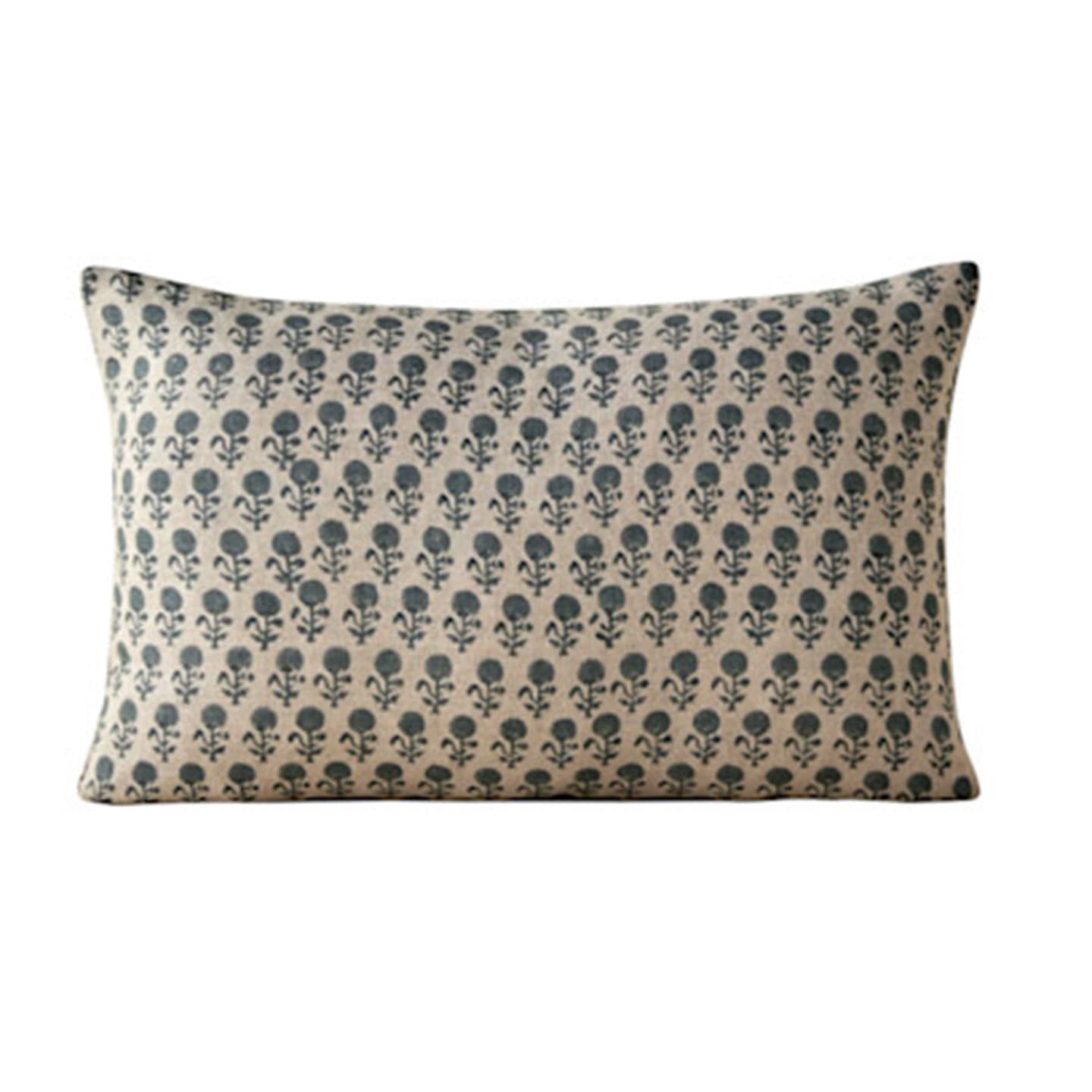 Rectangular pillow with navy floral block print on natural linen background.