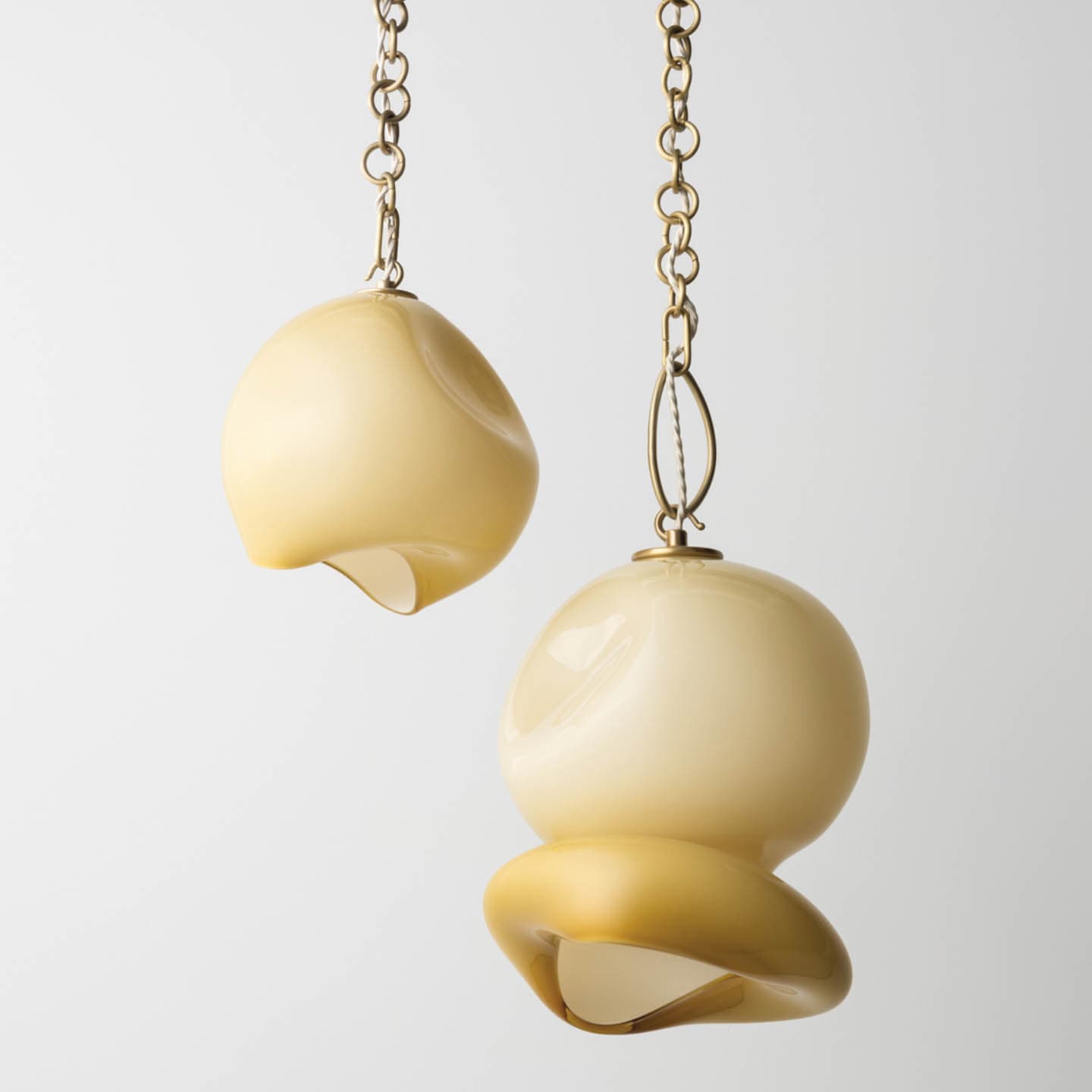 amber glass pendant lights with gold chains