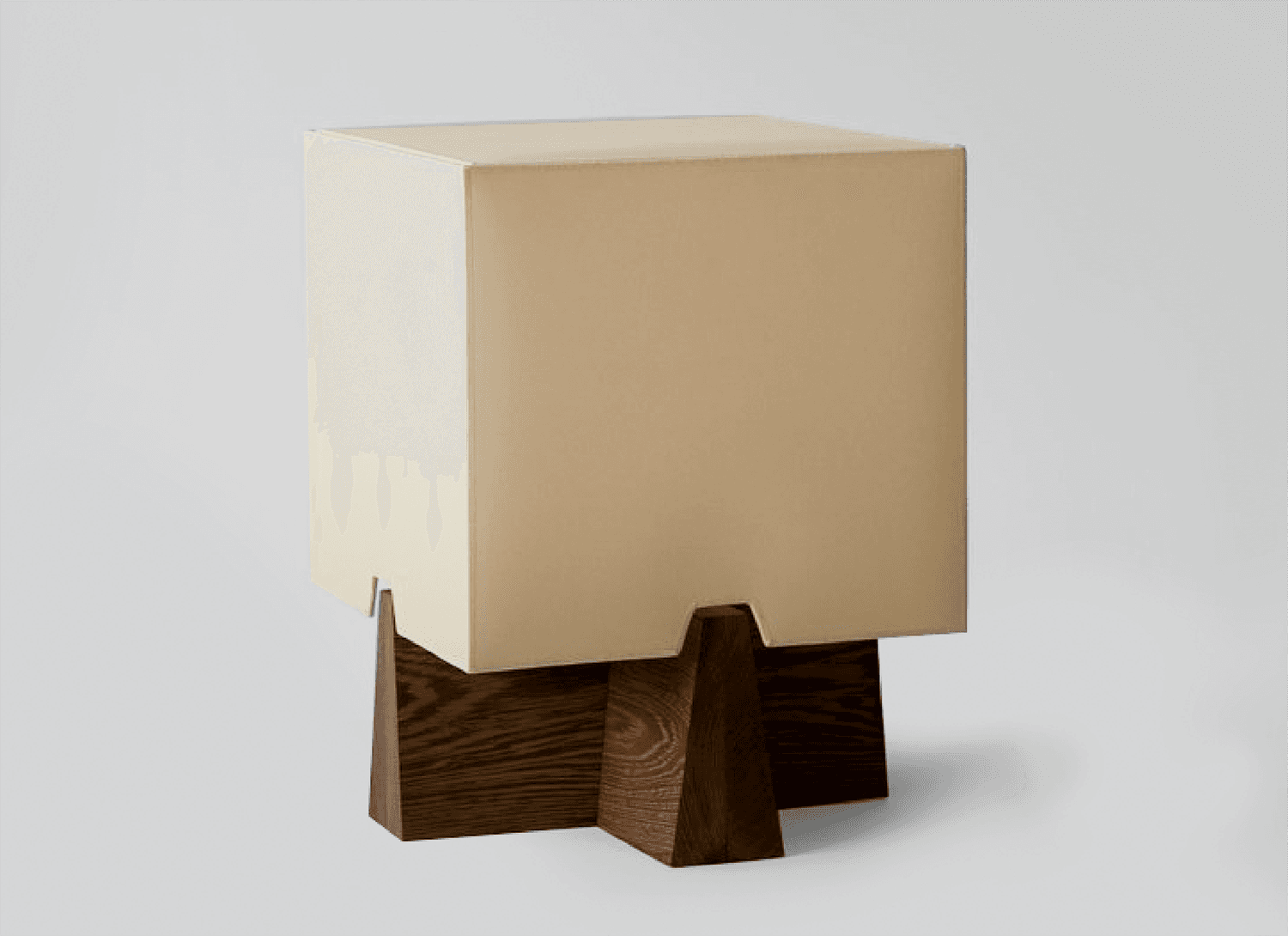 A rectangular table lamp with a wooden base and white lampshade.