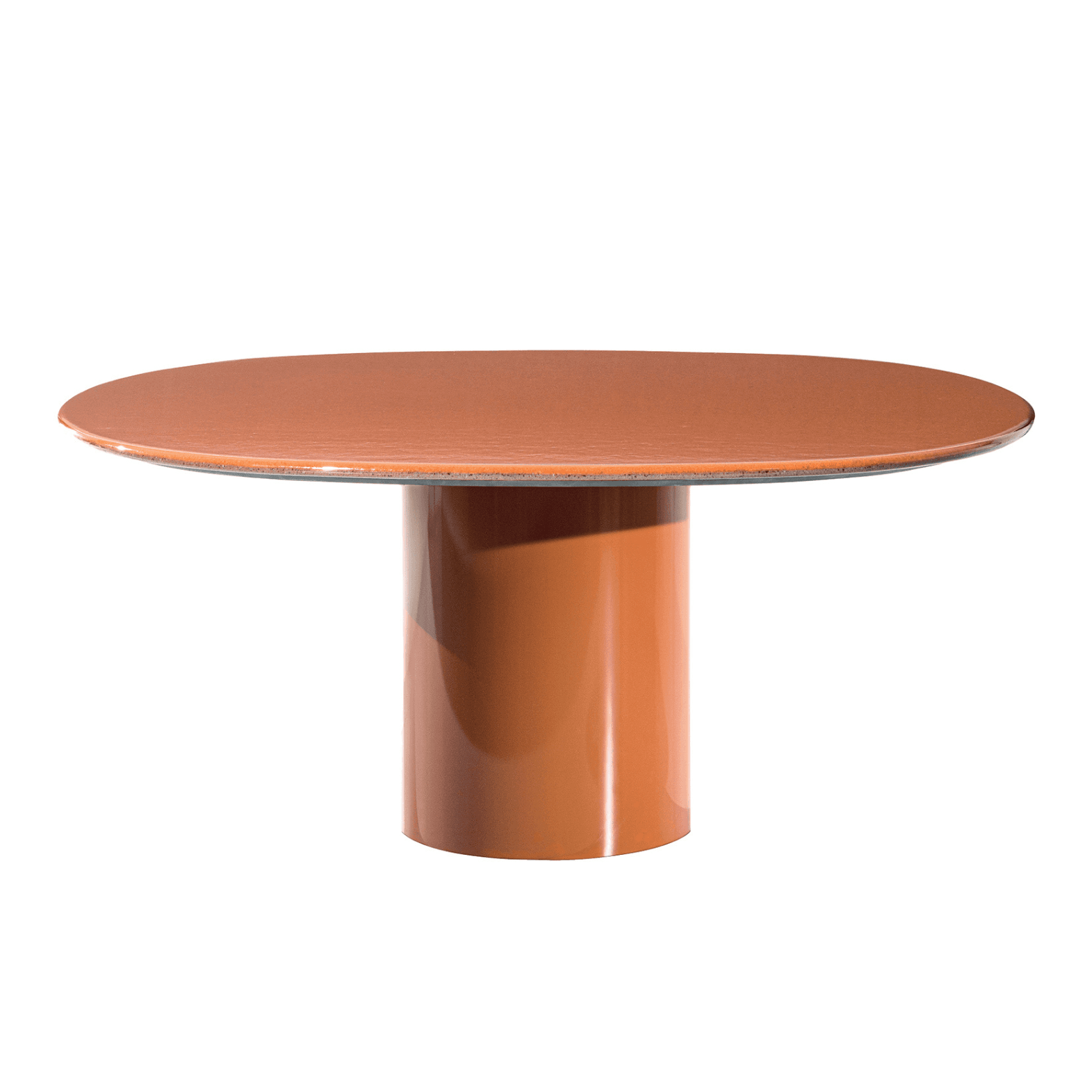 Minotti RAYAN outdoor table in rust finish with a sleek round top and sculptural base.