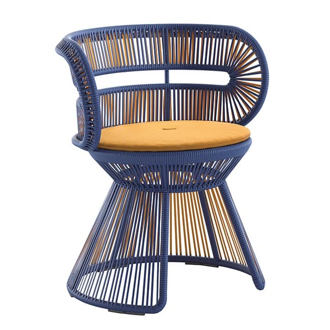 statement armchair with a woven base