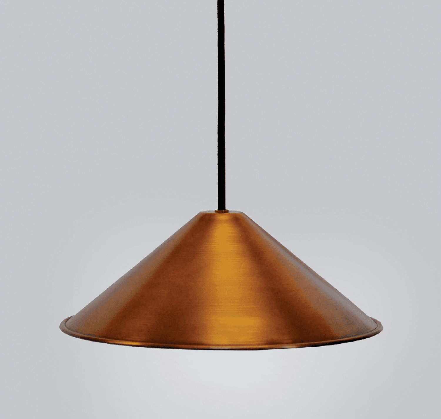 A brass cone-shaped lighting pendant.
