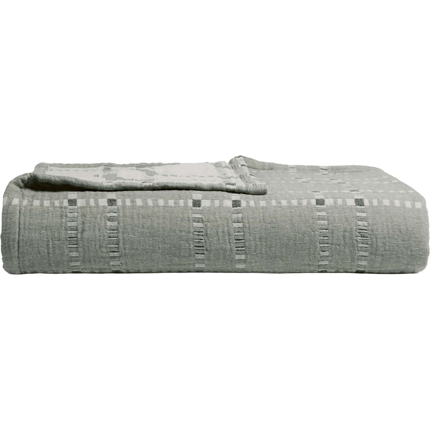 A gray patterned coverlet folded into a neat rectangle with one corner folded over.