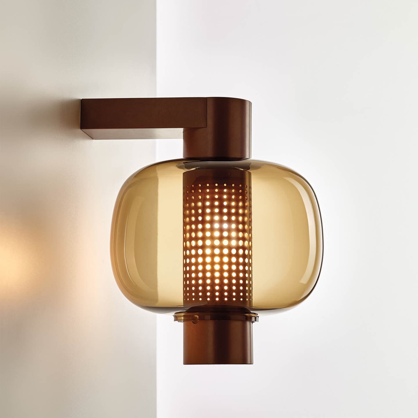 midcentury modern-style wall light with translucent brown glass