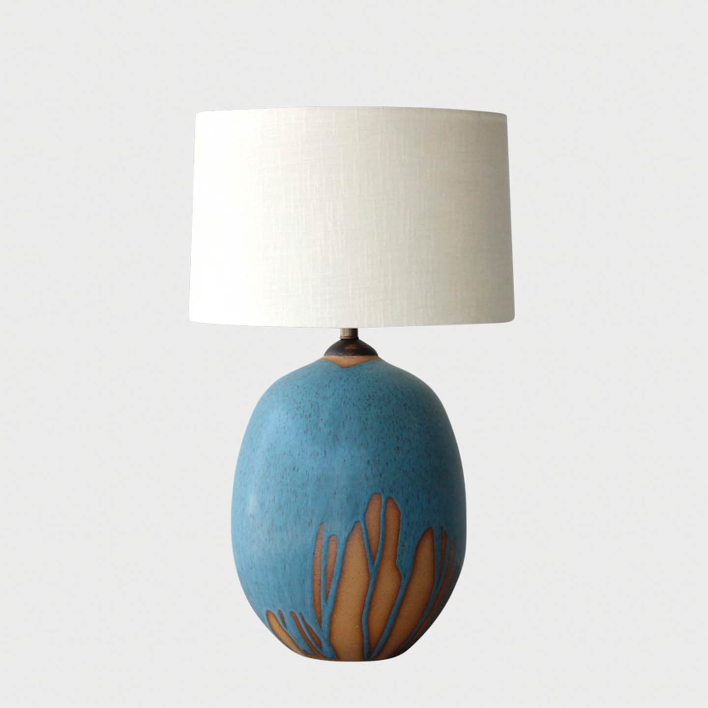 table lamp with a blue drip pattern on the body