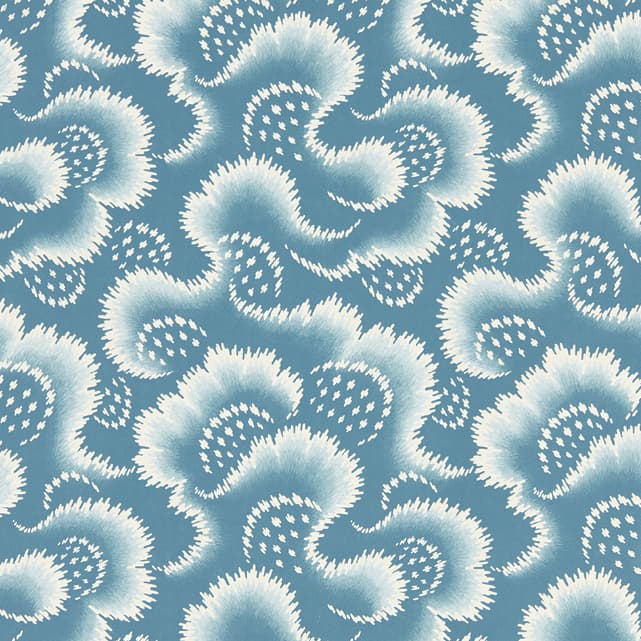 blue wallpaper with white floral motifs