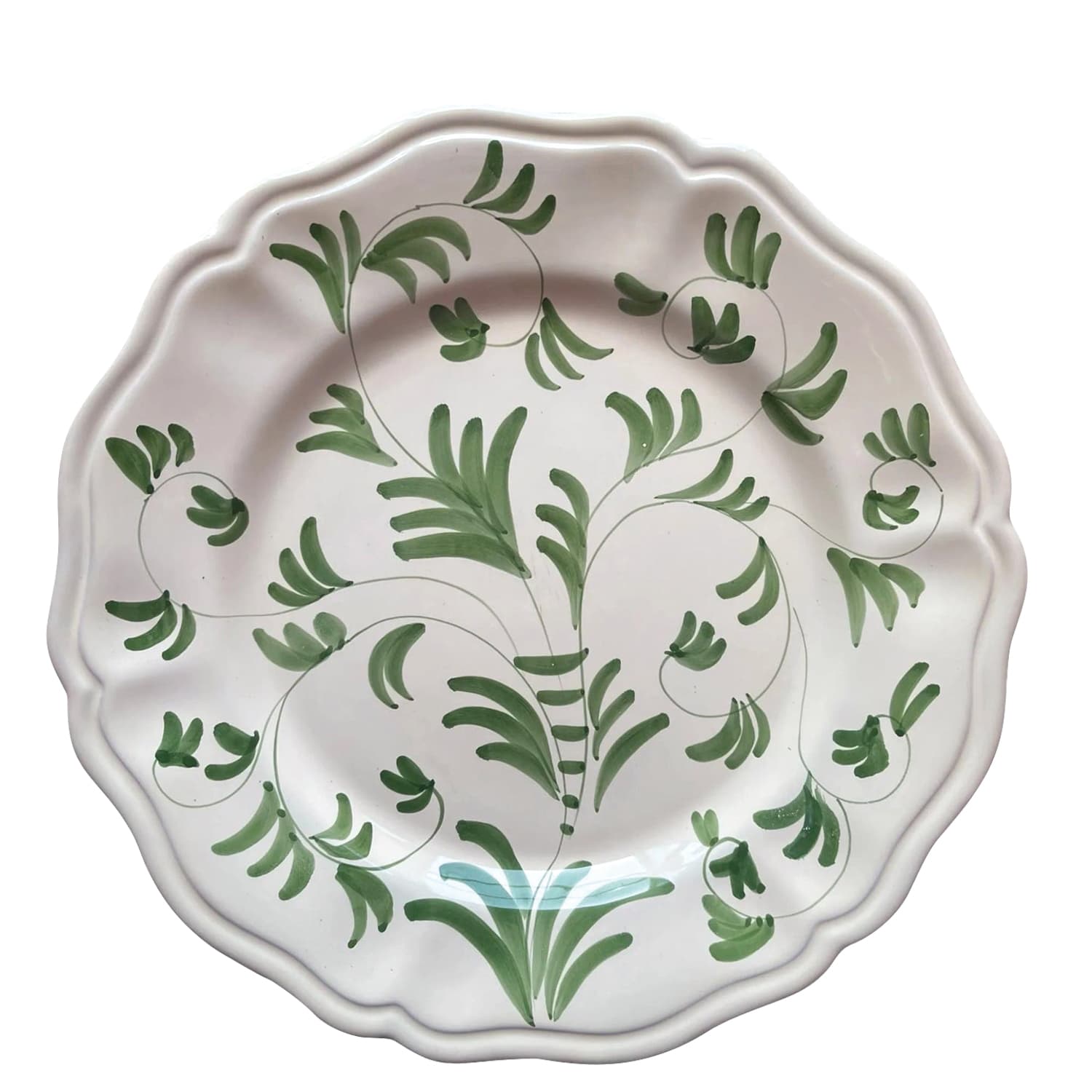 white dinner plate with a green vine-like motif