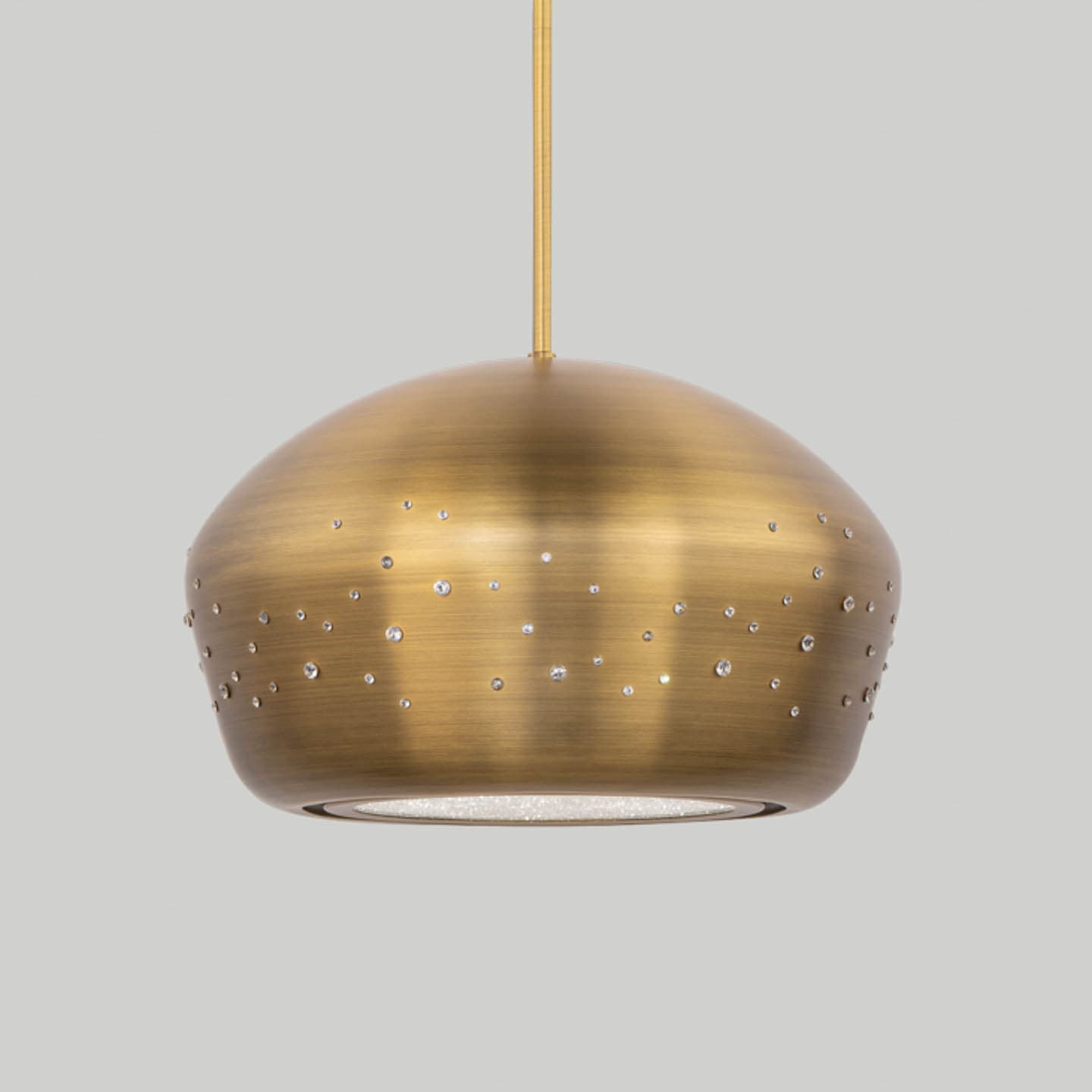 pendant light in aged brass