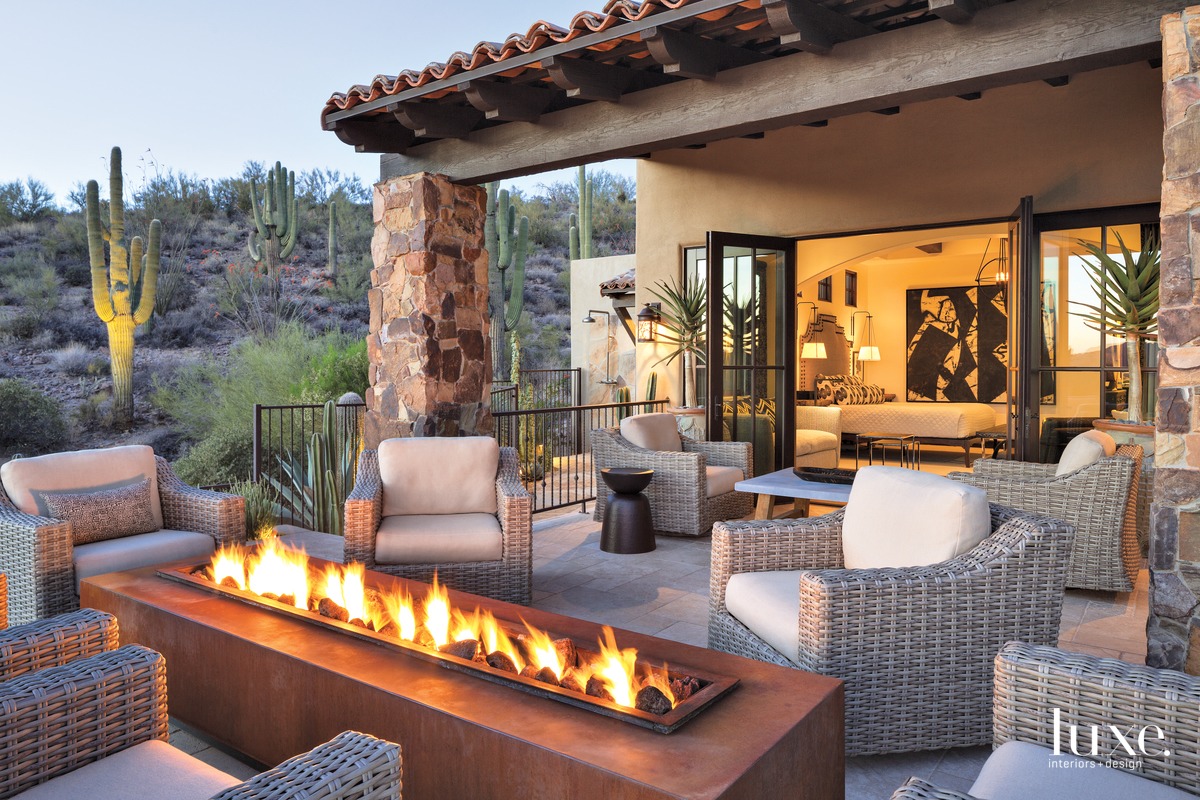 contemporary outdoor sitting area fire...
