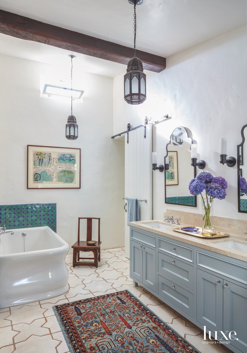 transitional bathroom blue accents little...