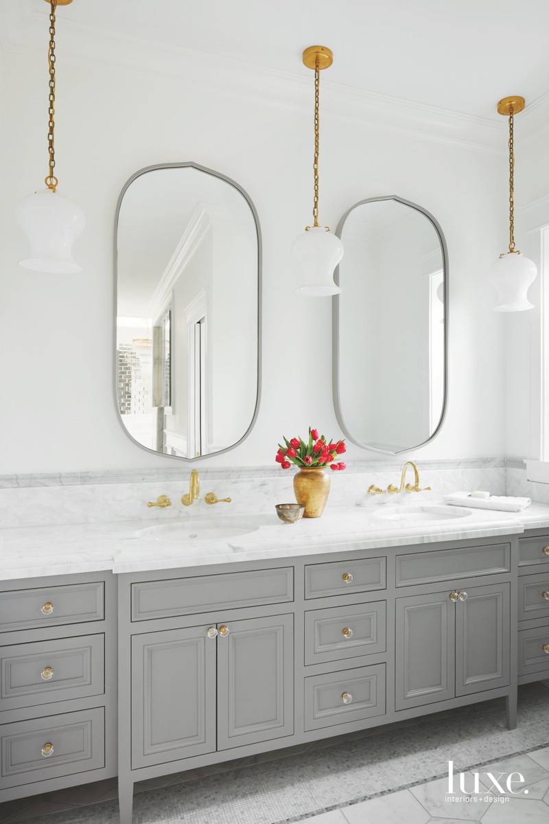 modern white bathroom gray cabinetry