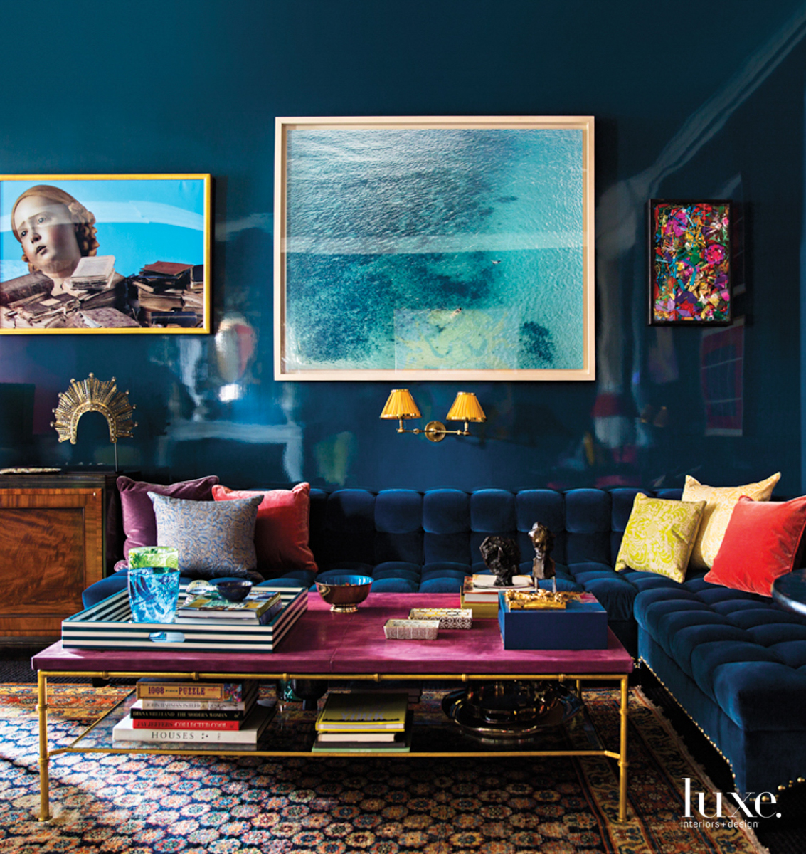 dark blue living room with installation art and magenta table representing maximalist interior designs