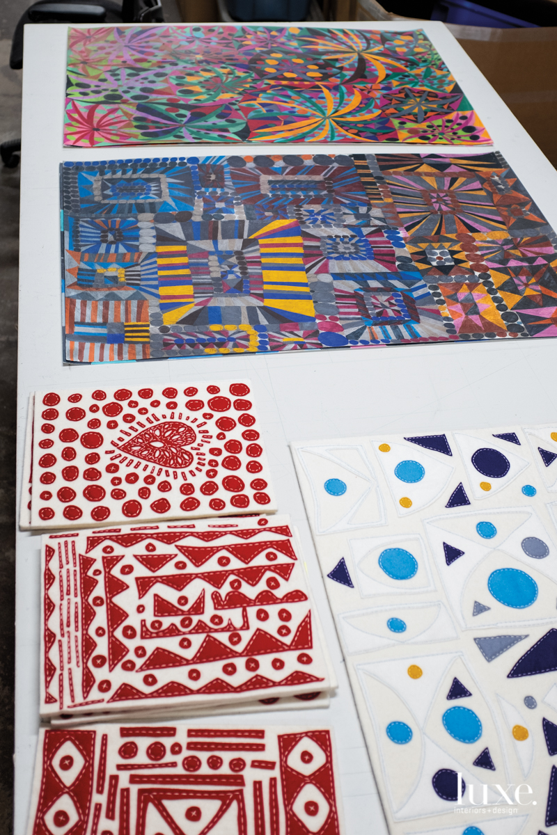 William O’Brien’s kaleidoscopic pieces on a white table