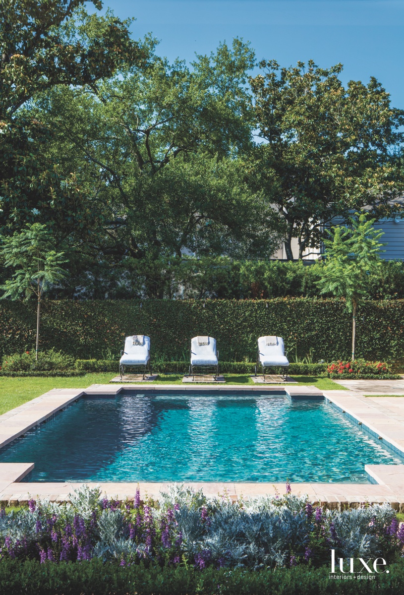 mid-century modern outdoor pool sitting...