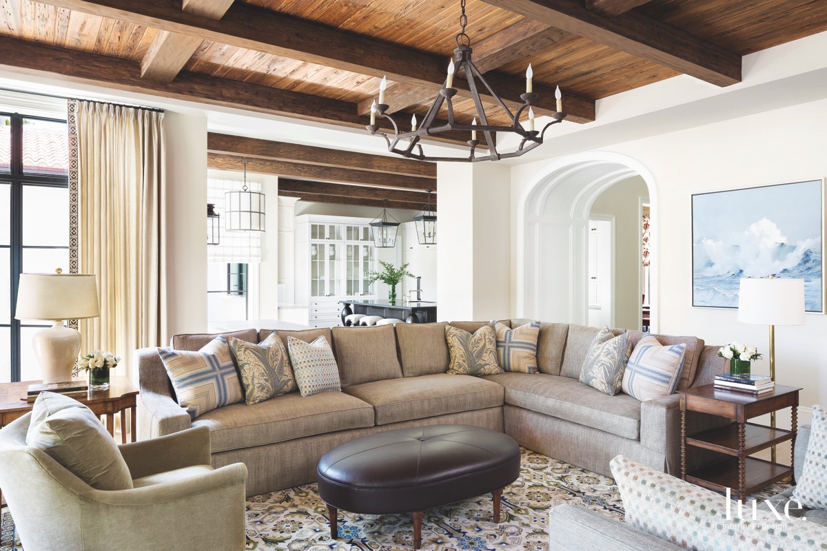 mediterranean family room gray sectional...