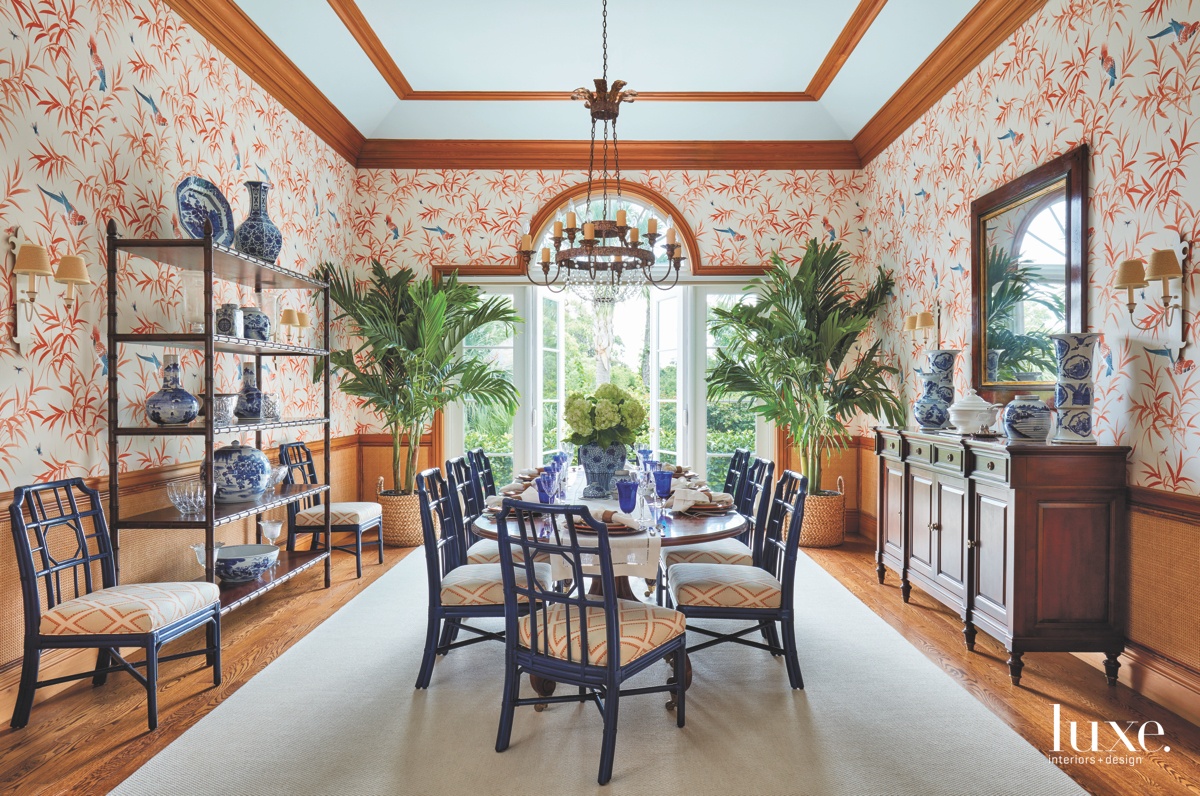 traditional dining room orange wallpaper...