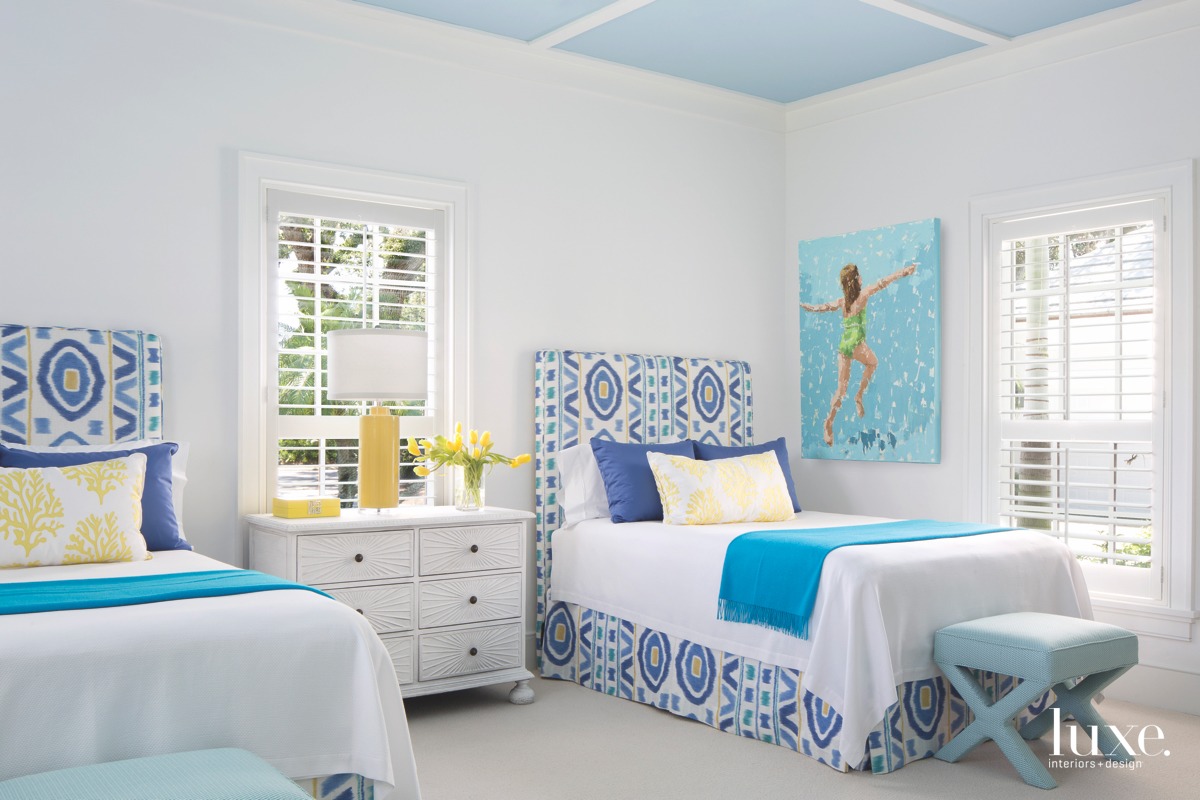 coastal bedroom white walls blue...