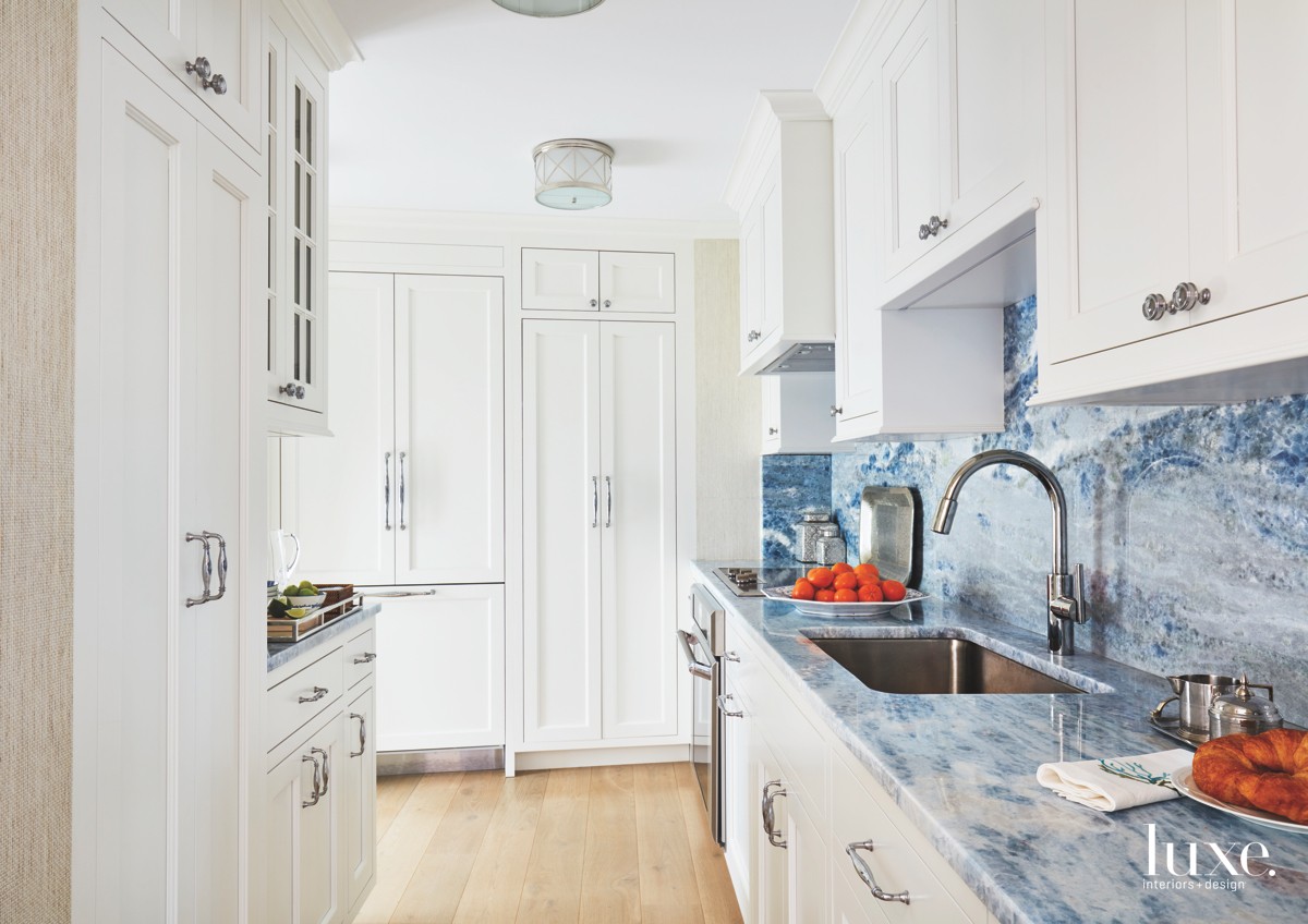 contemporary white kitchen blue hues...