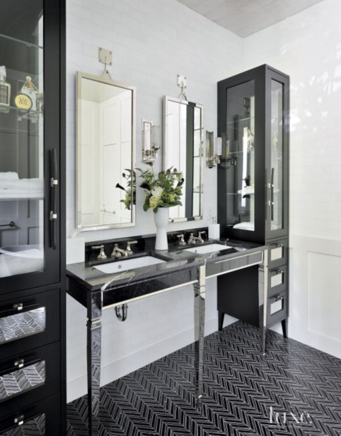 all black cabinets and sink in bathroom