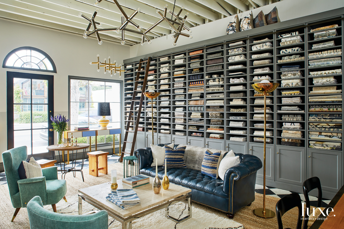 room with fabric shelves, blue couch and light blue armchair in article with Eco Outdoor