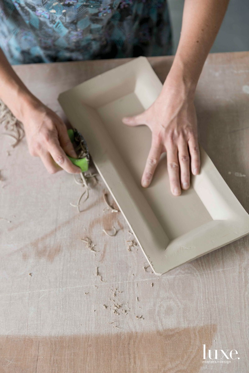 Tools help shape and carve her ceramic pieces, many of which are made for tabletop use