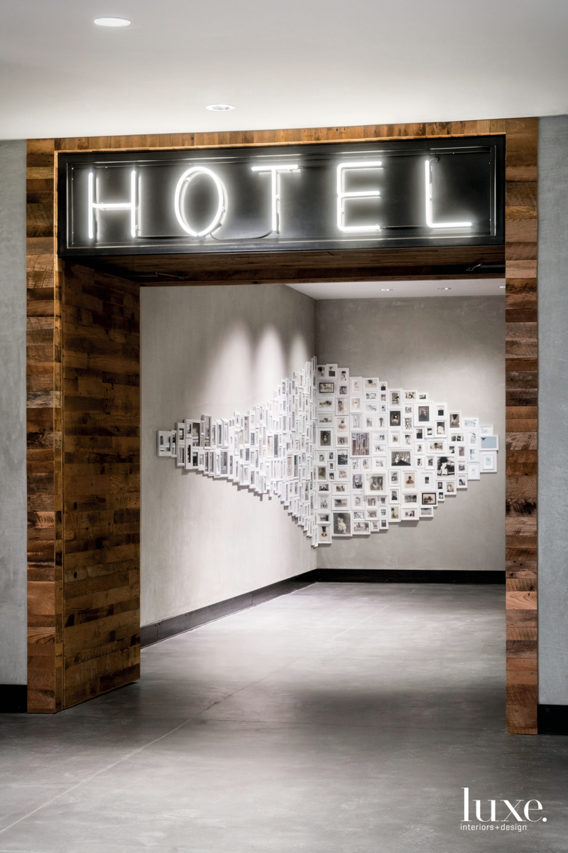 Maven hotel and Dark Matter Gathering with wall of over 300 black-and-white photographs