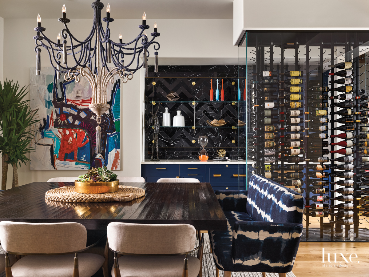 transitional dining room blue accents wine cellar