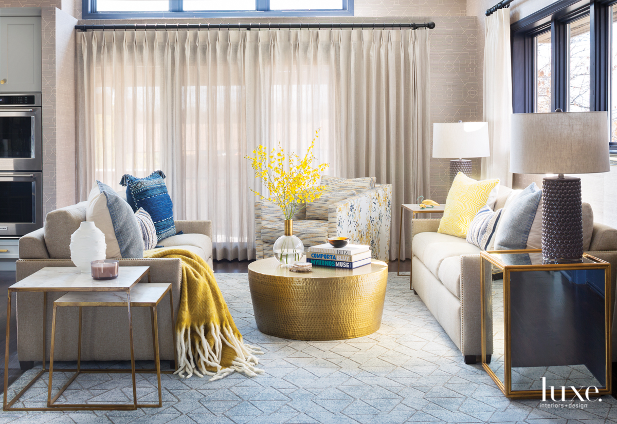 transitional neutral family room yellow accents