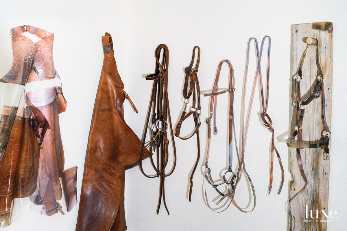 Artist Maeve Eichelberger creates sculpted pieces of Plexiglas that resemble horse tack.