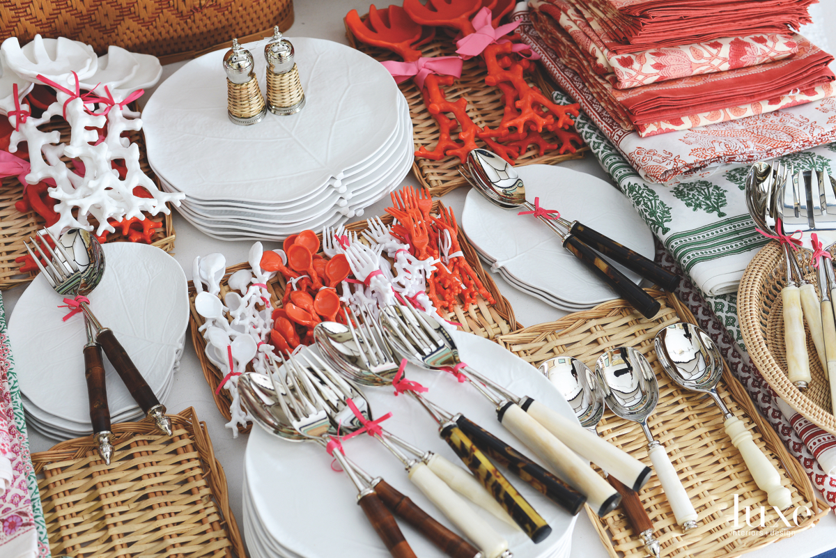 Coral-inspired cocktail utensils and salad servers accentuate the resort theme that is the backbone of the boutique's design aesthetic. From wicker-wrapped salt-and-pepper shakers to rattan trays, shop owner Amanda Lindroth's love for a range of materials is showcased throughout her store.