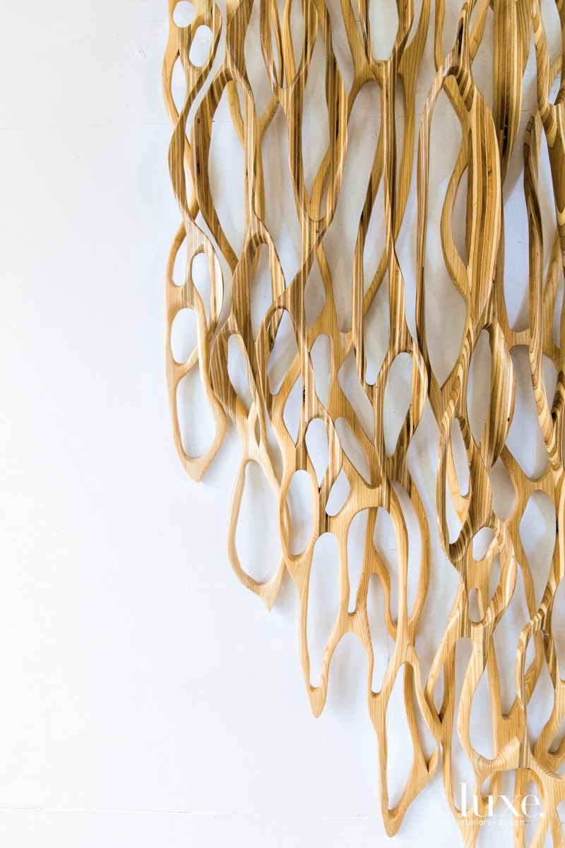 tan circles all combined together in sculpture by Caprice Pierucci