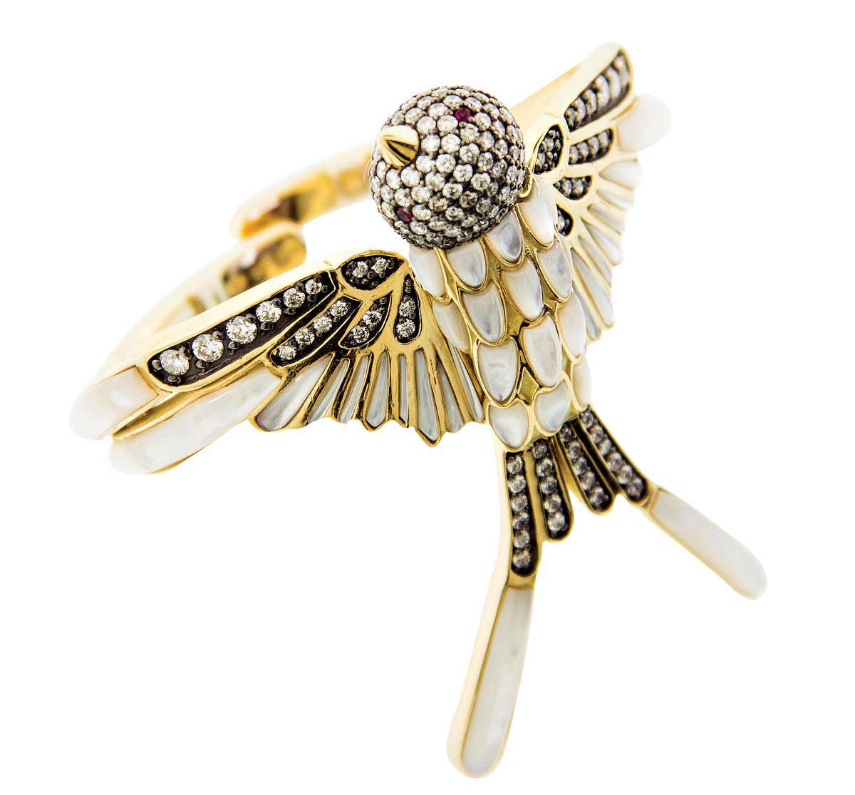 A bird-like bracelet made of diamonds, rubies and mother-of-pearl from Silvia Furmanovich's India Collection, available at Bergdorf Goodman.