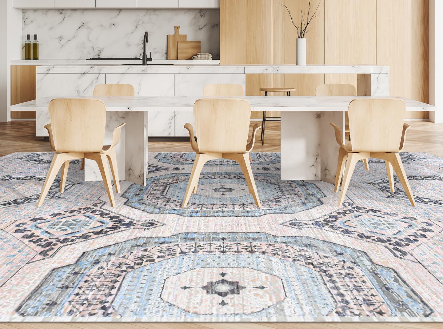 A modern dining room with a large blue and white patterned rug.