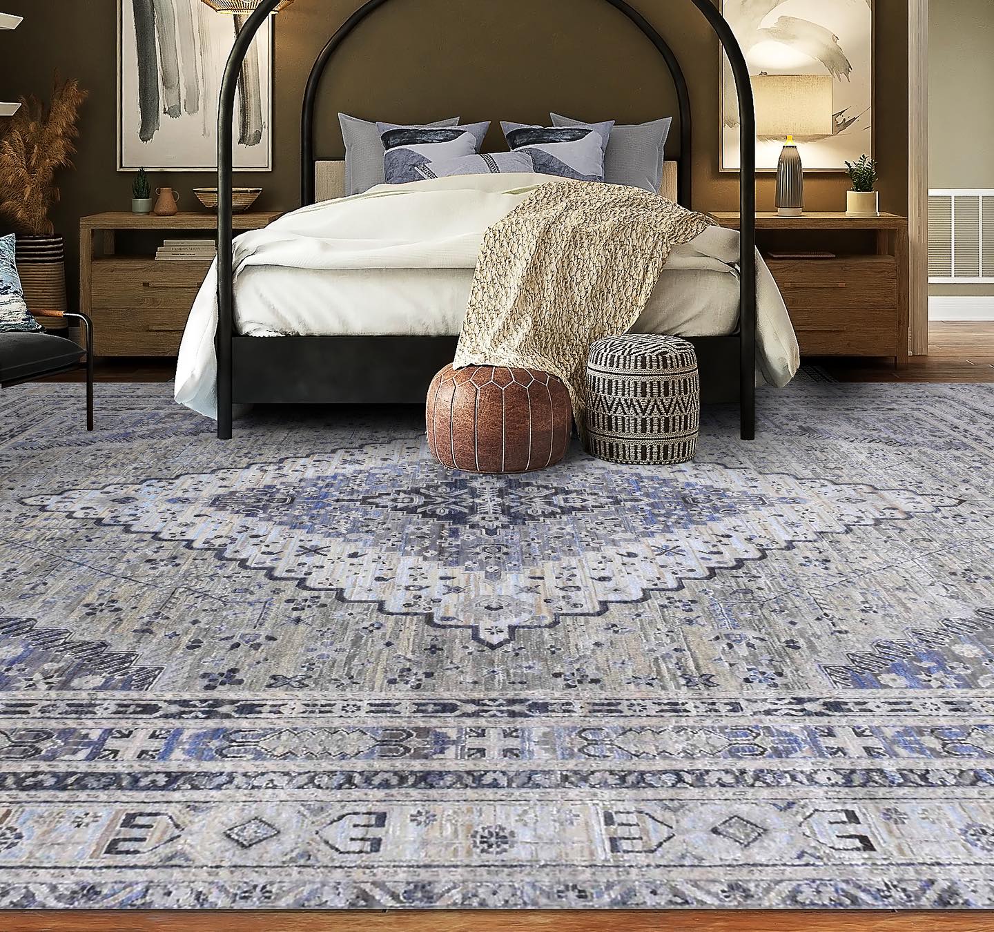 A spacious bedroom with a sizable blue and white area rug, adding a touch of elegance to the room's decor.