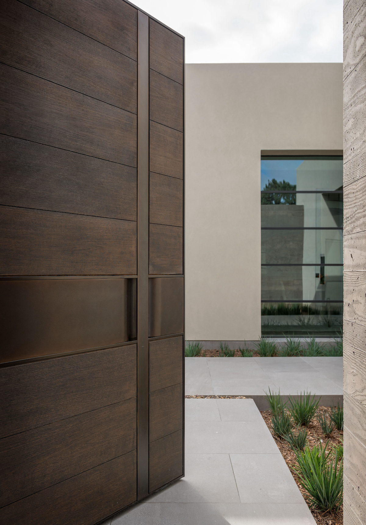 Custom Bronze Quartz Door. Design by Lucas Interior. Contactor, Hill Construction.