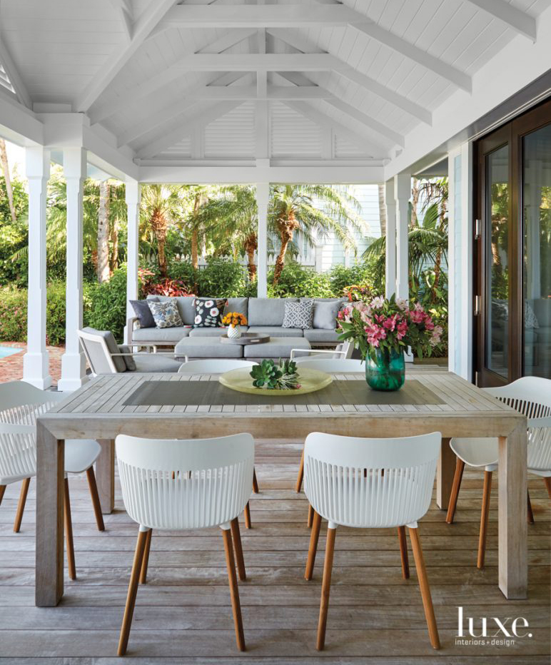 white back porch with dining...