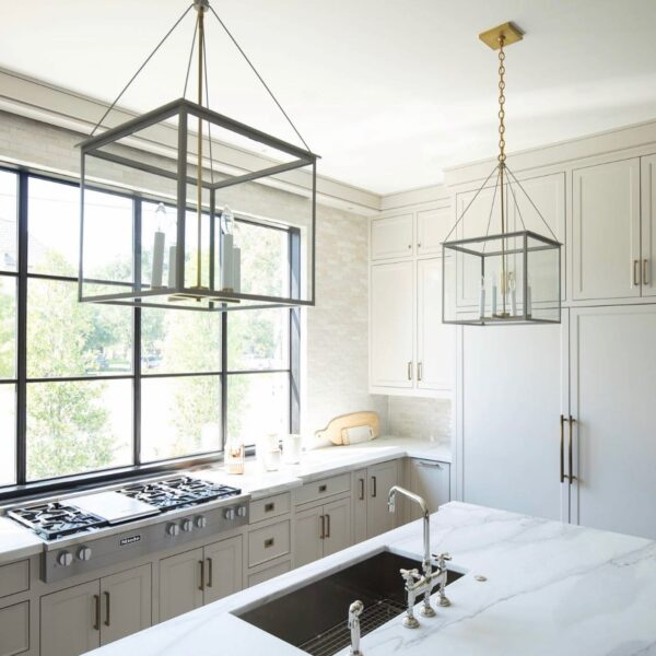 kitchen island view with big windows and pendant lighting