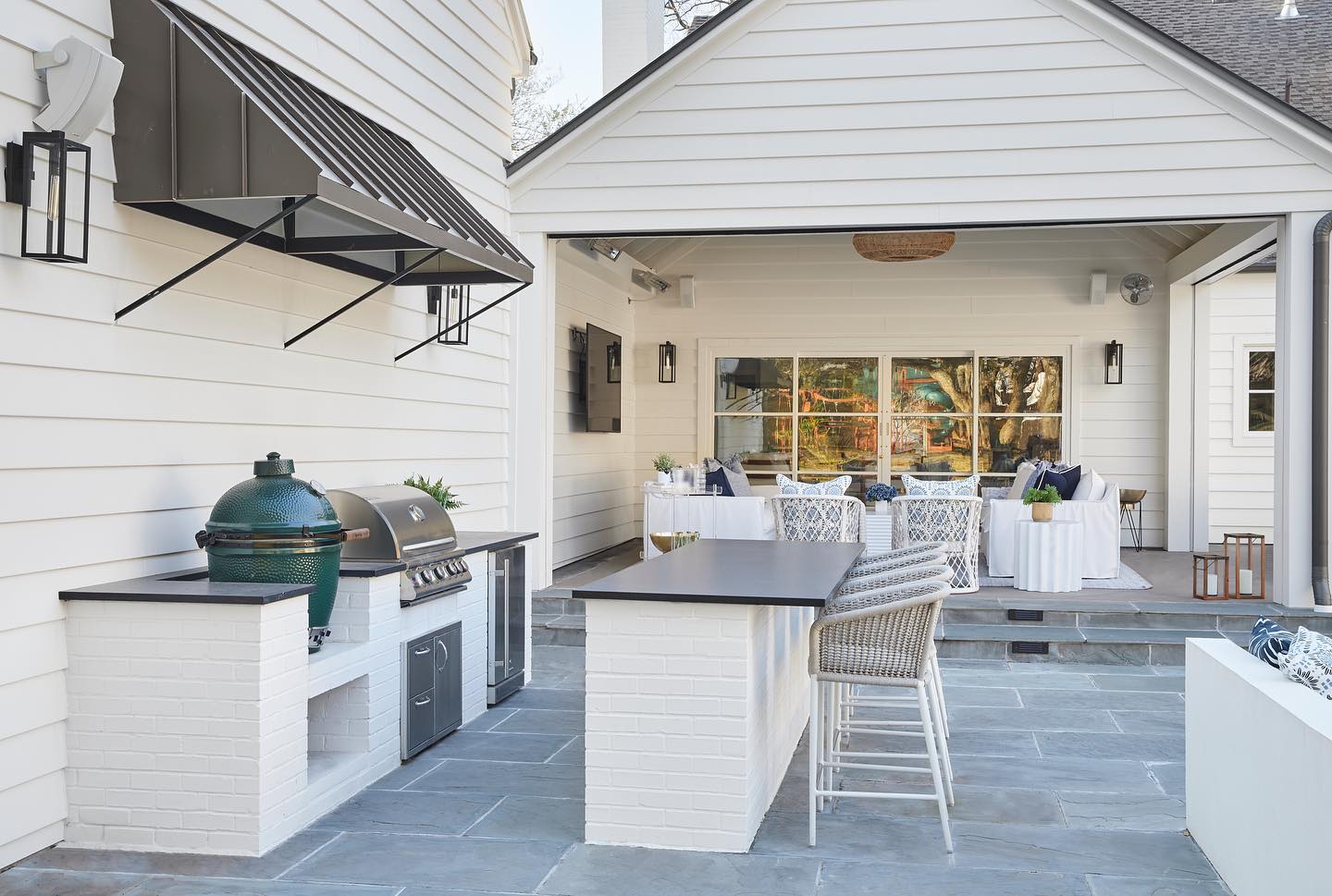 backyard bbq with this outdoor kitchen entertainment area
