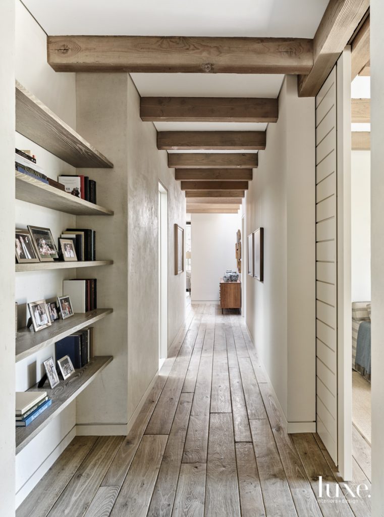 To contrast with the more modern materials in the main living area, Miller used white oak plank floors from France in a hallway for a more rustic look.