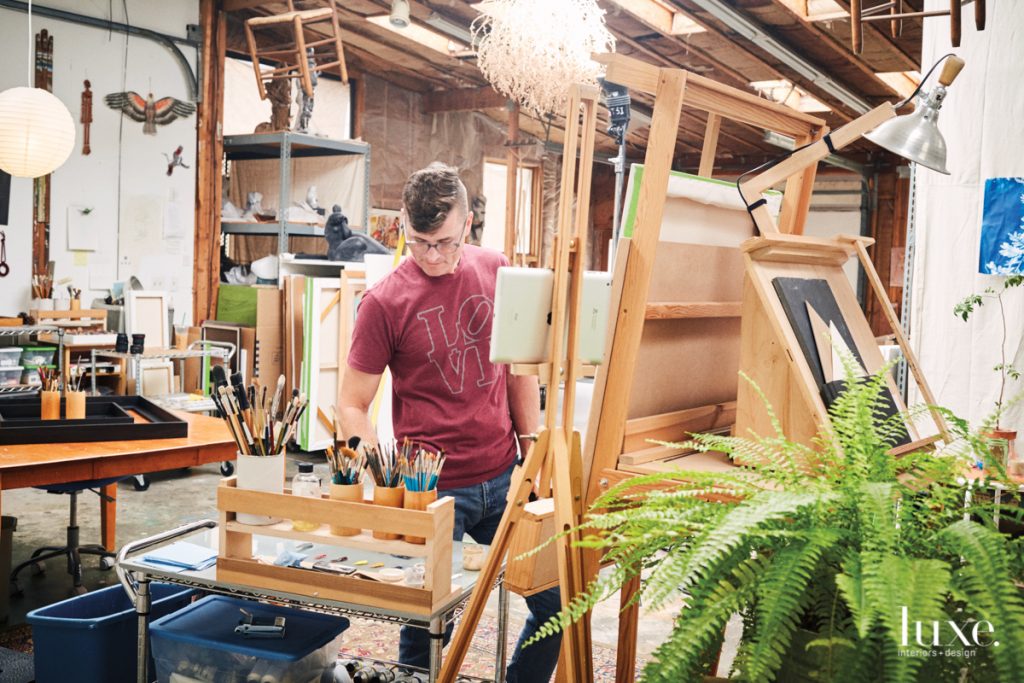The artist Ben Johnson at work in his studio.