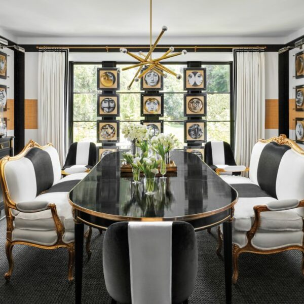 Classic Principles Take On A Funky Spin In A Bold Home Near Lake Michigan dining room with fornasetti collection and french furniture