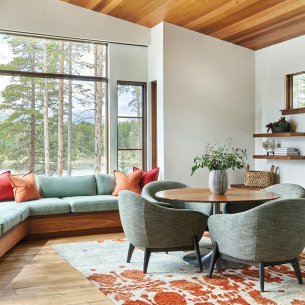 Kick Back And Relax At This Lakeside Retreat Amid The Rockies window seat in family room