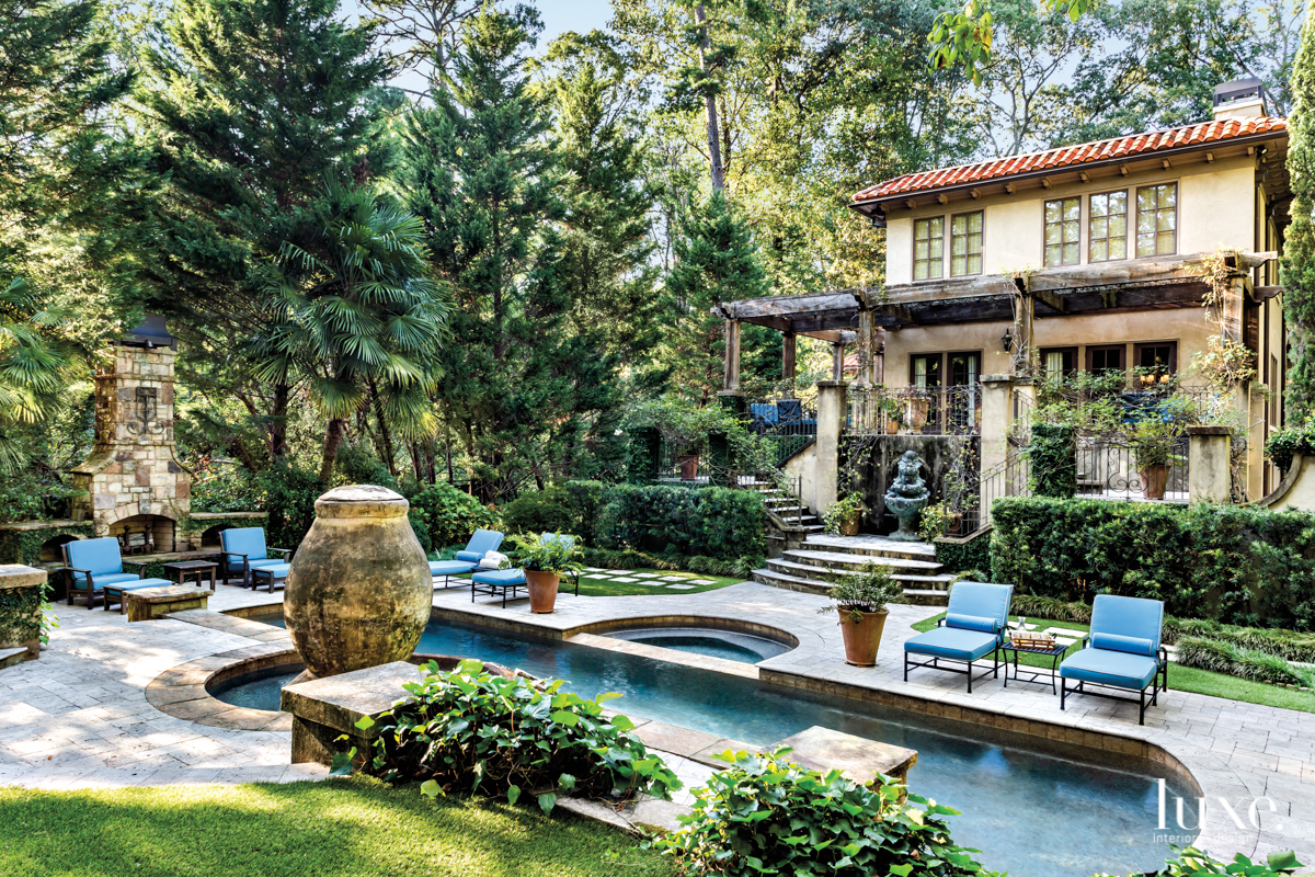 exterior tuscan pool terrace and lush greenery serve as garden inspiration