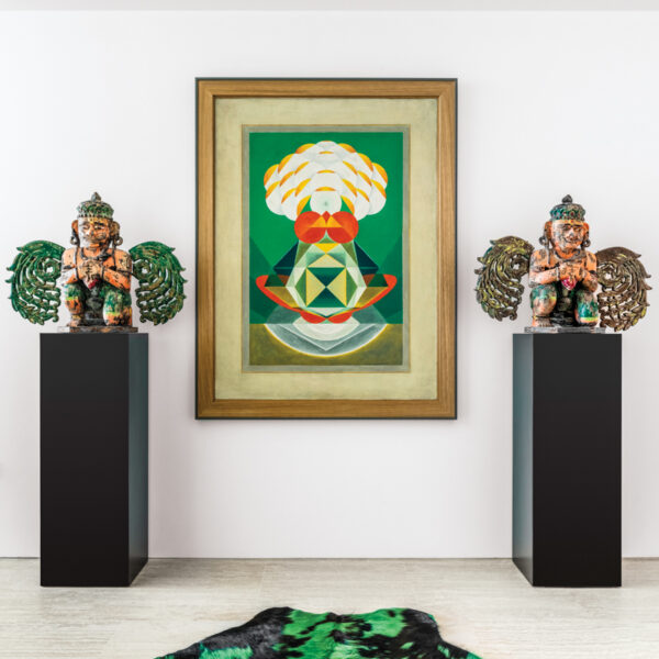 Colorful Art, Textural Accents Bring Vibrancy To A Miami Vacation Home antique garuda sculptures on pedestals