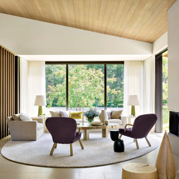 Inside The Rural California Home Designed For Parties And Moments Of Peace neutral living room purple vintage armchairs