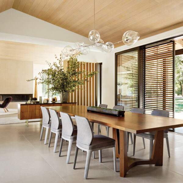 Inside The Rural California Home Designed For Parties And Moments Of Peace slatted sliding doors neutral organic dining room