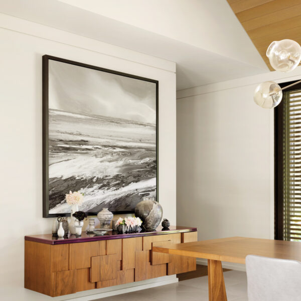 Inside The Rural California Home Designed For Parties And Moments Of Peace walnut credenza with lee seung ha artwork