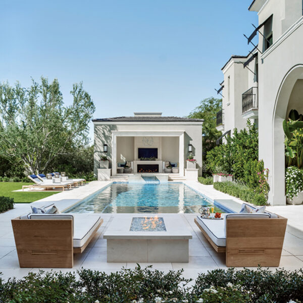 The Posh Arizona Oasis That Blends Beloved Pieces With Luxury Materials pool backyard with cabana and firepit