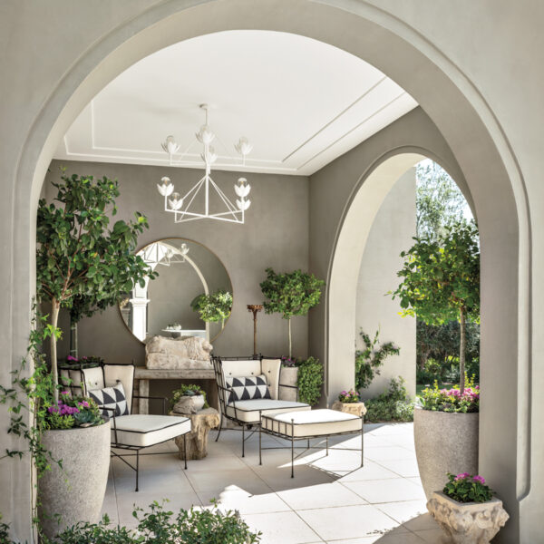 The Posh Arizona Oasis That Blends Beloved Pieces With Luxury Materials outdoor pavillion with greenery and sutherland sofas